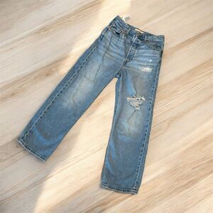 Levi's Light Blue Straight Leg Jeans with Distressed Detail